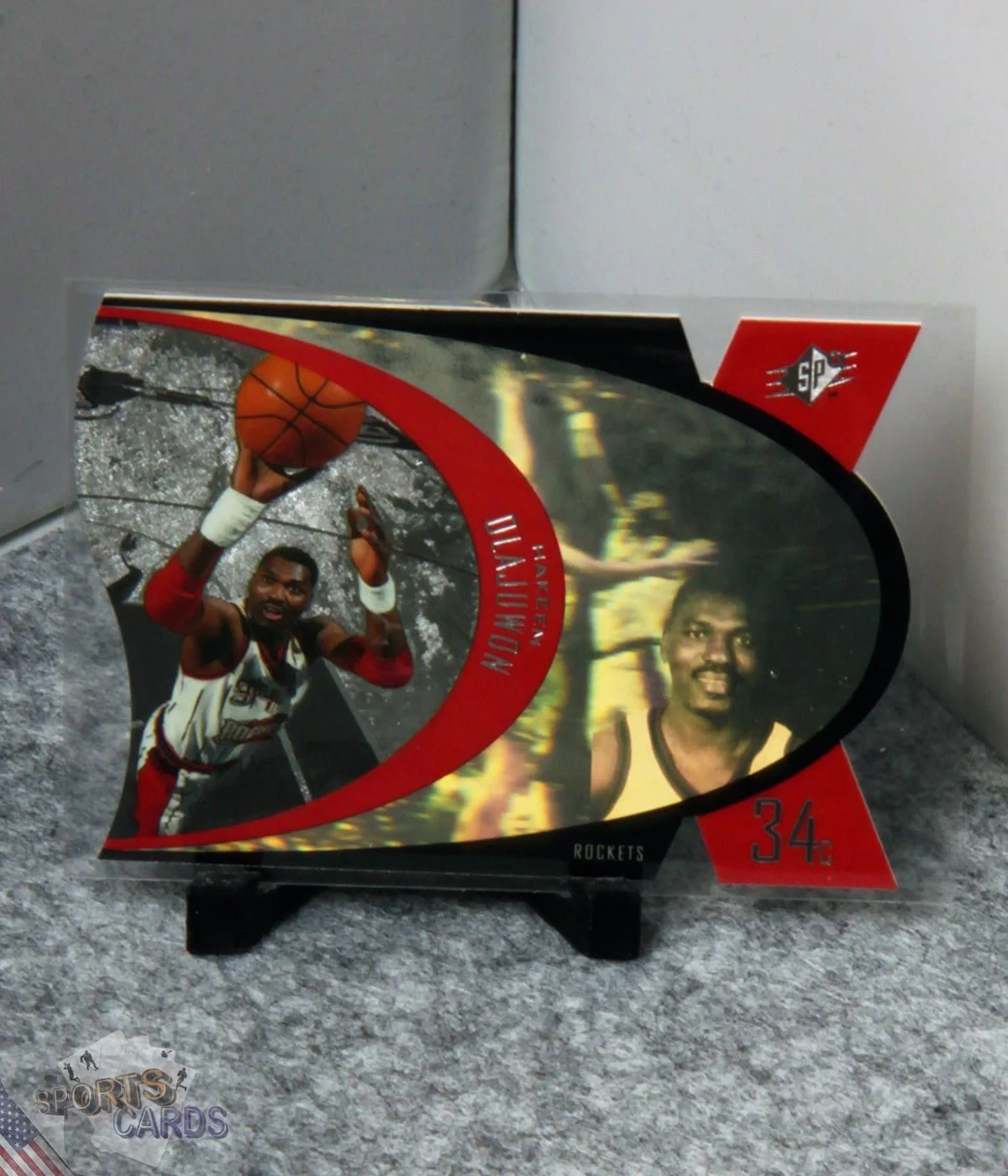 1997-98 Hakeem Olajuwon #SPX17 Upper Deck SPx Die-Cut Hologram-stand