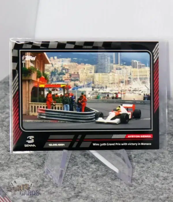 2023 Ayrton Senna #34 Topps Story of Senna Wins 30th GP with victory in Monaco-stand