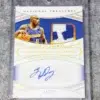 2021-22 Tim Hardaway #GGA-THW Panini National Treasures Game Gear Autographs /25-front