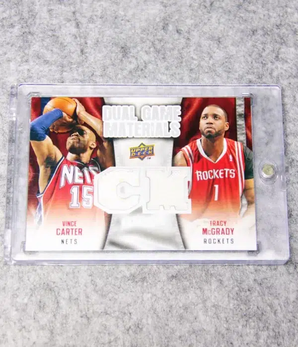 2009-10 Vince Carter & Tracy McGrady #DG-VT Upper Deck Dual Game Materials - front