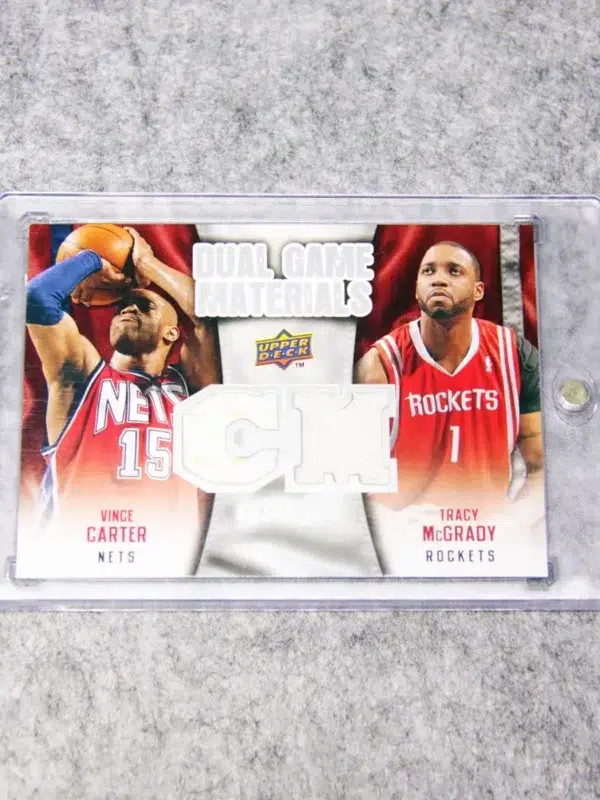 2009-10 Vince Carter & Tracy McGrady #DG-VT Upper Deck Dual Game Materials - front