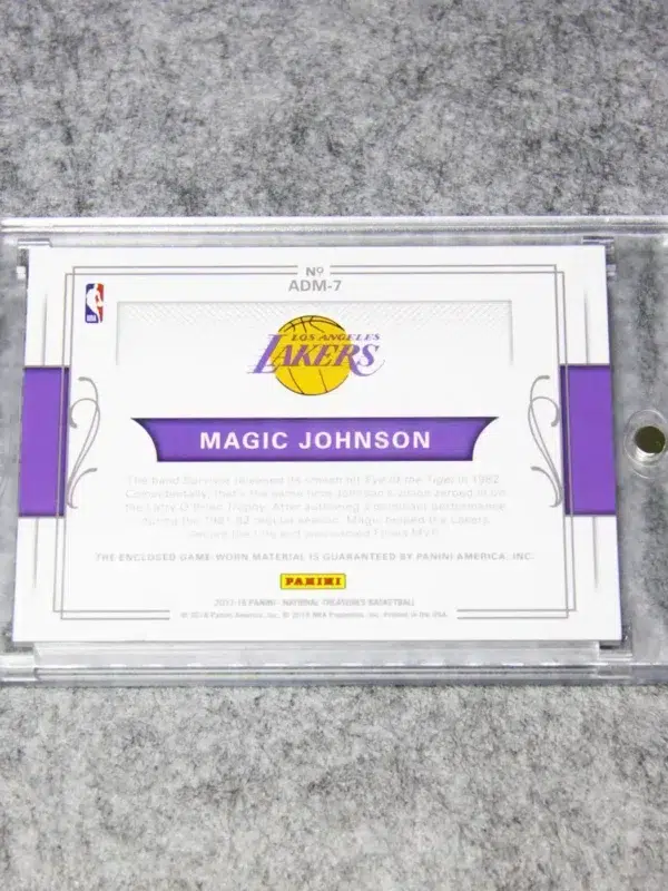 2017-18 Magic Johnson #ADM-7 Panini National Treasures All-Decade 1980s Materials SN#25 - back