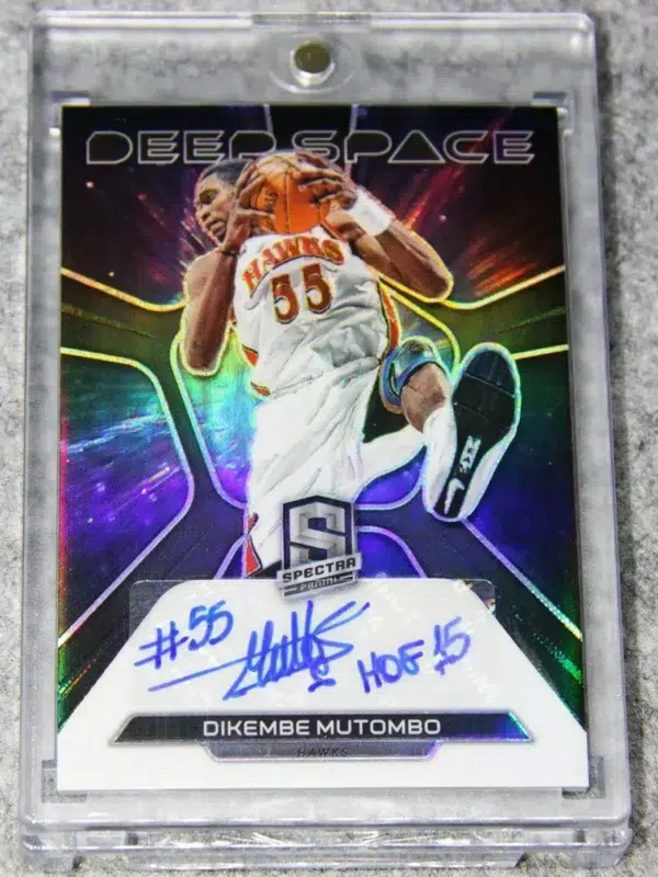 2022-23 Dikembe Mutombo #DS-KAH Panini Spectra Deepspace Autograph Silver Prizm SN#91 - front