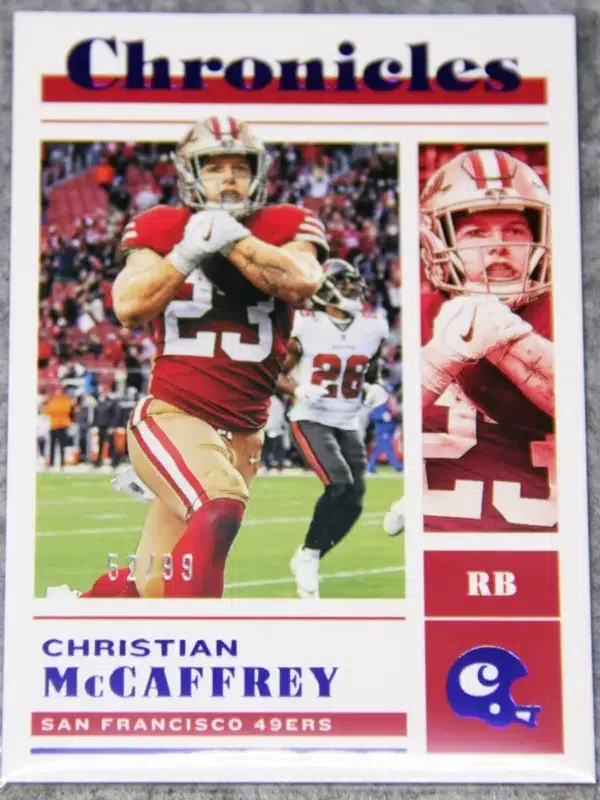 2022 Christian McCaffrey #29 Panini Chronicles Blue Parallel SN#52 - front