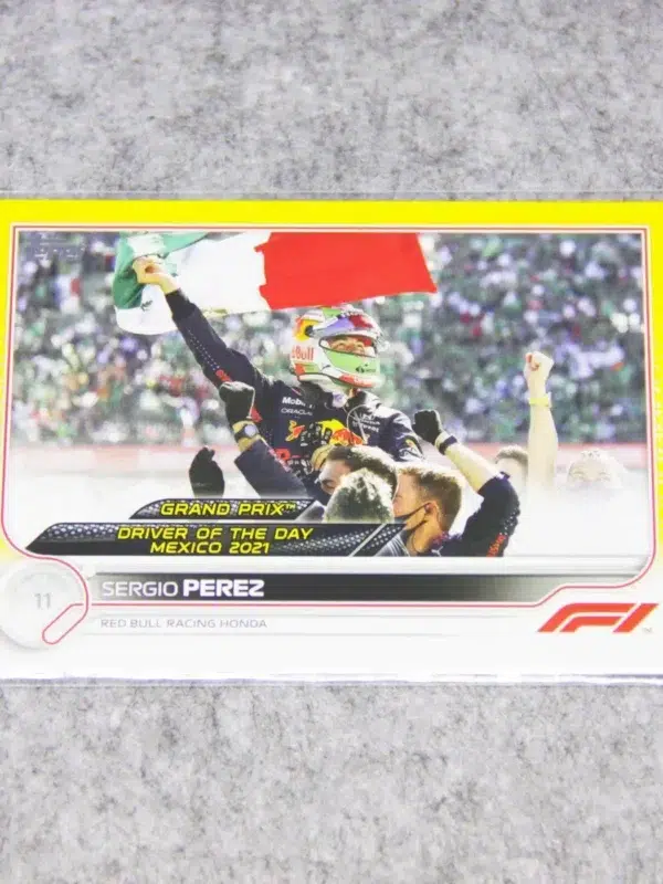 2022 Sergio Perez #189 Topps F1 Grand Prix Driver Of The Day Yellow Refractor SN#110 - front