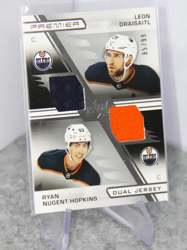 2021-22 Leon Draisaitl & Ryan Nugent-Hopkins #PD-DN Upper Deck Premier Dual Jersey SN#85 - stand