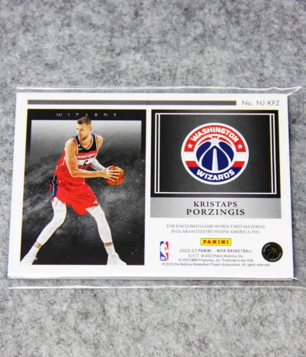 2022-23 Kristaps Porzingis #NJ-KPZ Panini Noir Newsreels Game Used Jerseys SN#45 - back