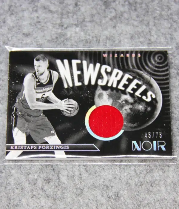 2022-23 Kristaps Porzingis #NJ-KPZ Panini Noir Newsreels Game Used Jerseys SN#45 - front