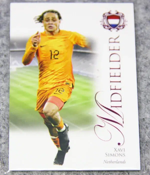 2023 Xavi Simons #056 Futera Unique Football Midfielder Pink SN#18 - front