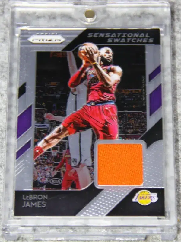 2018-19 LeBron James #59 Panini Prizm Sensational Swatches Orange GU Patch - front