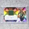 2022-23 Jrue Holiday #AM-JRH Panini Select Autographed Memorabilia Purple Prizm SN#7 - front