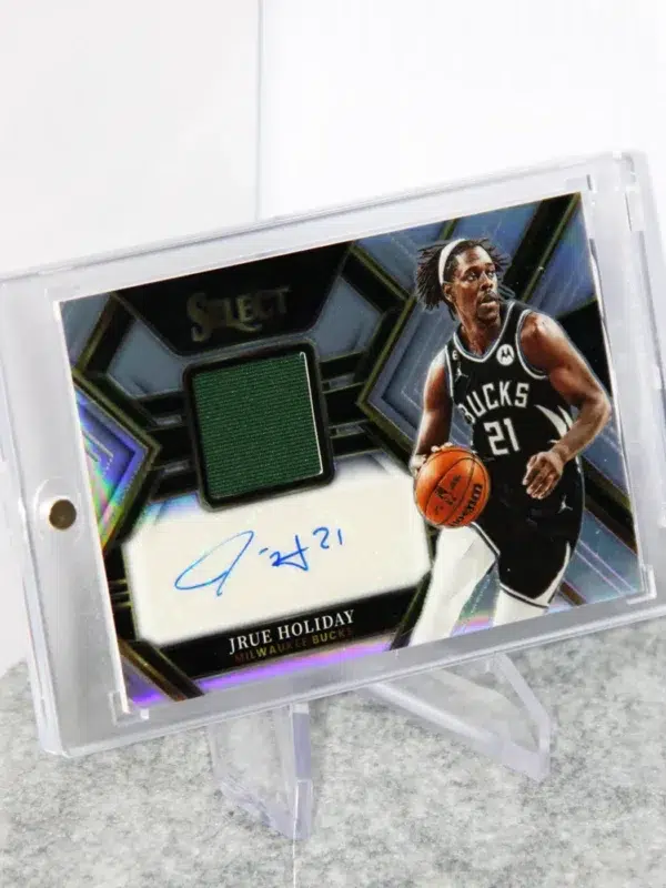 2022-23 Jrue Holiday #AM-JRH Panini Select Autographed Memorabilia Purple Prizm SN#7 - stand