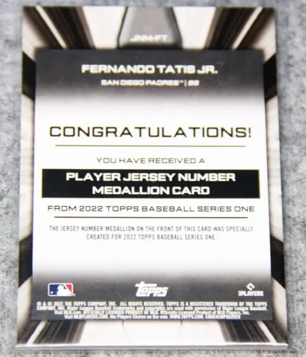 2022 Fernando Tatis Jr. #JNM-FT Topps Series 1 Commemorative Jersey Number Medallion - back