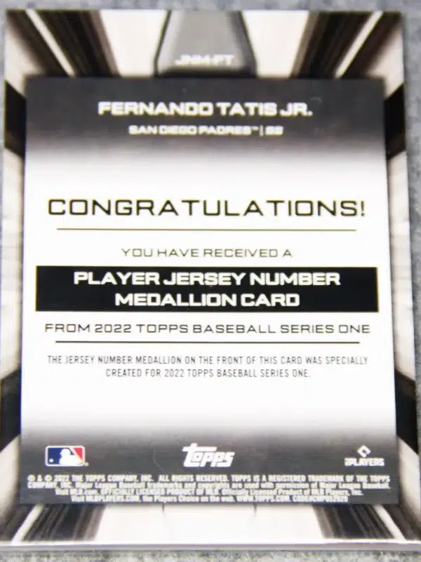 2022 Fernando Tatis Jr. #JNM-FT Topps Series 1 Commemorative Jersey Number Medallion - back