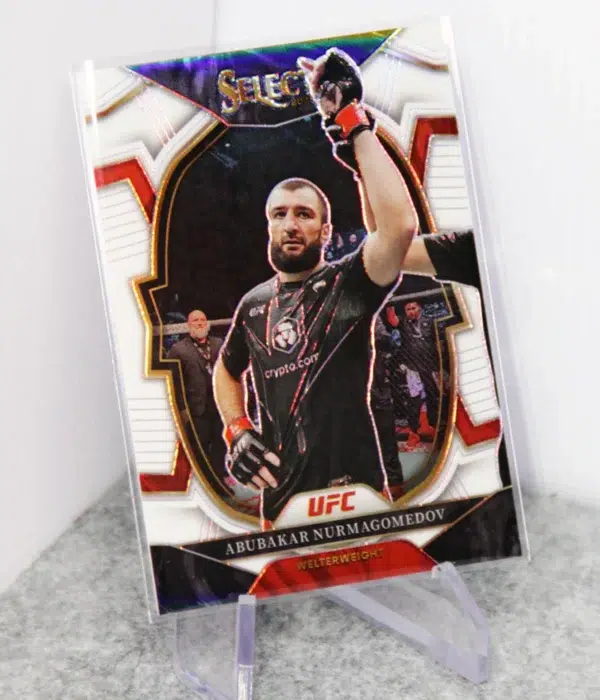 2023 Abubakar Nurmagomedov #8 Panini Select Concourse White Prizm SN#33 - stand