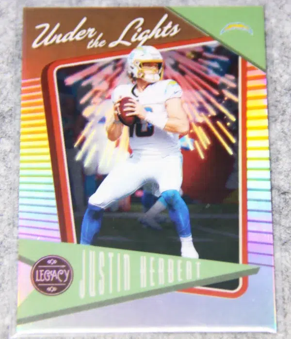 2022 Justin Herbert #UL-31 Panini Legacy Under the Lights Bronze SN#63 - front