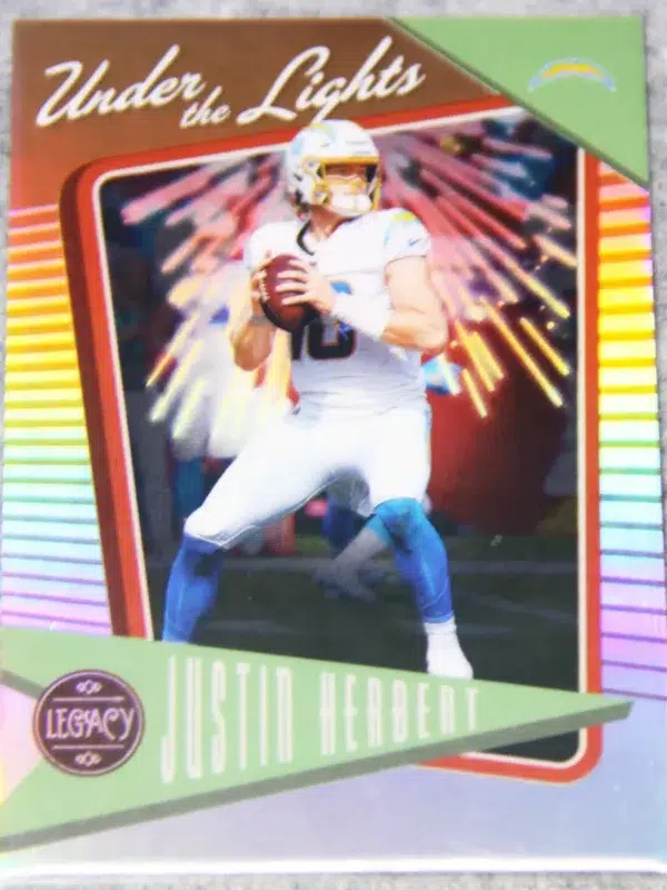 2022 Justin Herbert #UL-31 Panini Legacy Under the Lights Bronze SN#63 - front