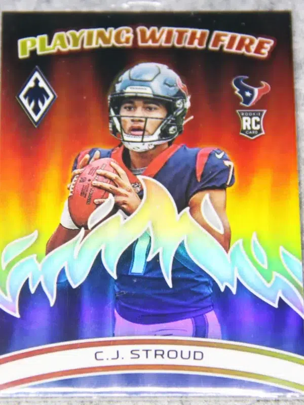 2023 C.J. Stroud #PWF-2 Panini Phoenix Playing With Fire Silver Holo RC - front