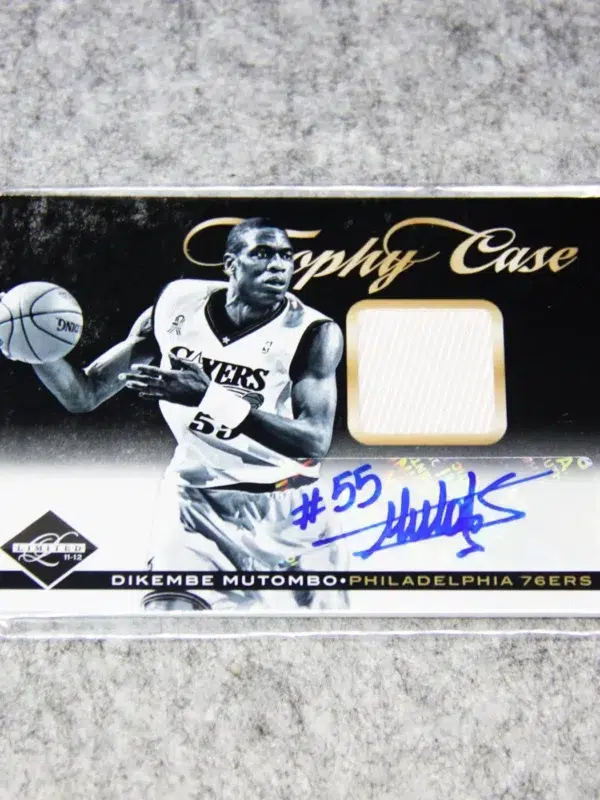 2011-12 Dikembe Mutombo #43 Panini Limited Trophy Case Patch Autograph SN#19 - front