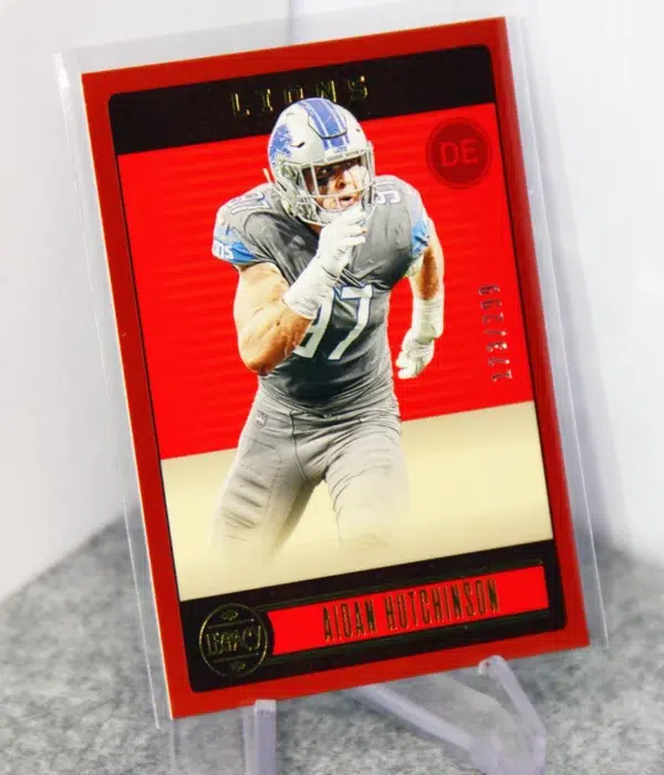 2023 Aidan Hutchinson #32 Panini Legacy Red Parallel SN#173 - stand