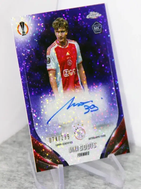 2023-24 Mika Godts #CA-MG Topps Chrome UEFA Club Competitions Purple Speckle Refractor RC Autograph SN#74 - stand