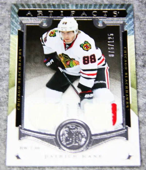 2015-16 Patrick Kane #55 Upper Deck Artifacts Hockey Dual Jersey SN#76 - front