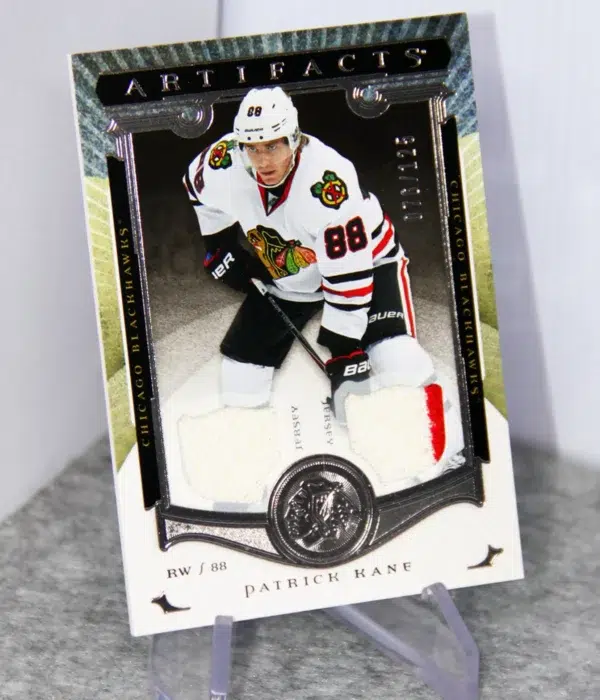 2015-16 Patrick Kane #55 Upper Deck Artifacts Hockey Dual Jersey SN#76 - stand