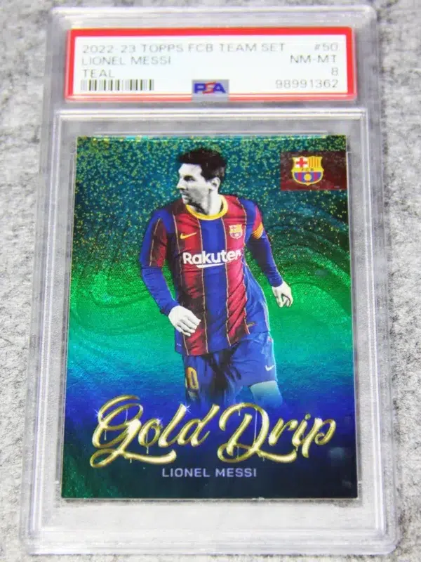 2022-23 Lionel Messi #50 Topps FC Barcelona Team Set Teal Gold Drips SN#131 PSA 8 NM-MT - front