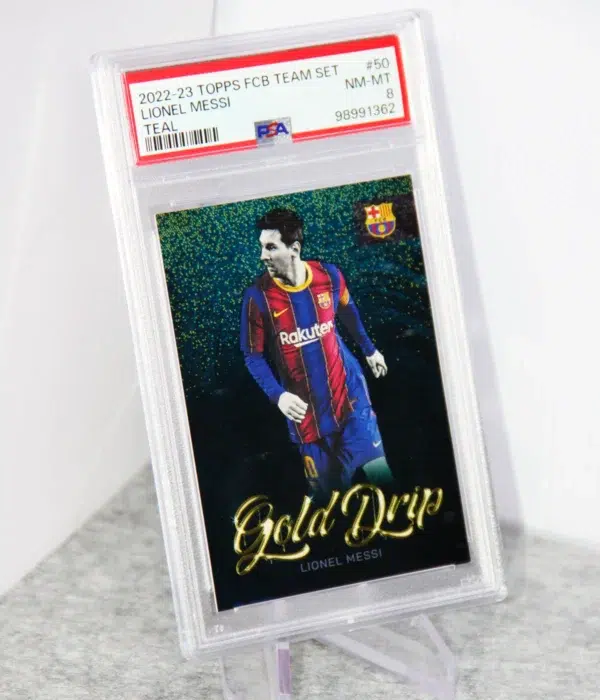 2022-23 Lionel Messi #50 Topps FC Barcelona Team Set Teal Gold Drips SN#131 PSA 8 NM-MT - stand