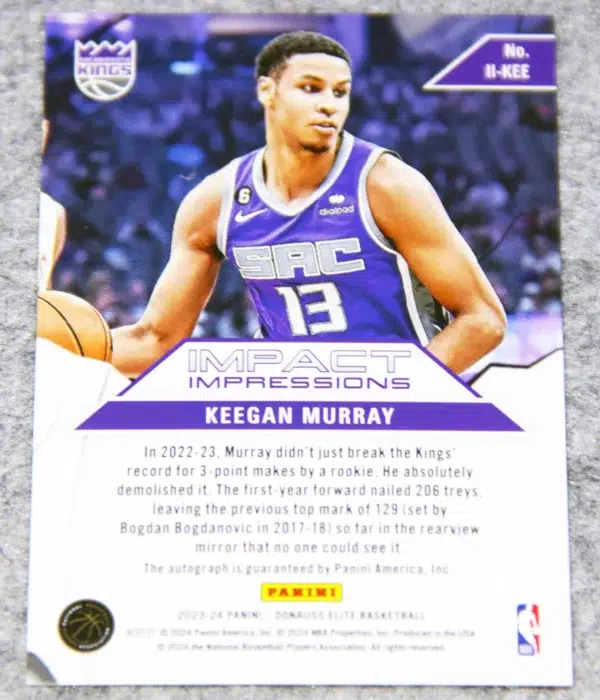 2023-24 Keegan Murray #II-KEE Panini Donruss Elite Impact Impressions Red Green Int’l Autograph - back