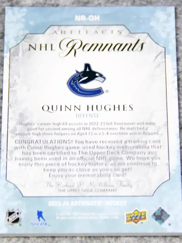 2023-24 Quinn Hughes #NR-QH Upper Deck Artifacts NHL Remnants Jersey Patch - back