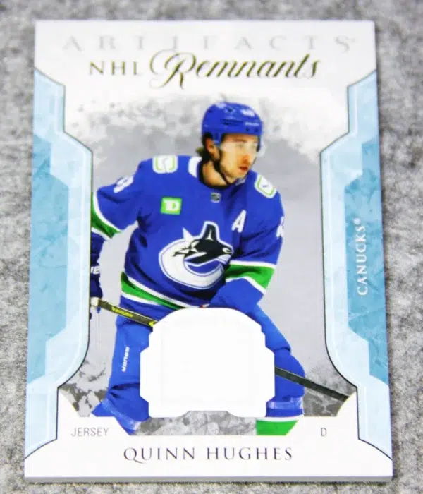 2023-24 Quinn Hughes #NR-QH Upper Deck Artifacts NHL Remnants Jersey Patch - front
