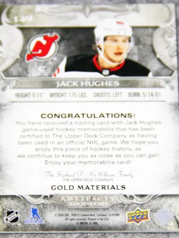 2024-25 Jack Hughes #149 Upper Deck Artifacts Hockey Dual Gold Materials SN#175 - back