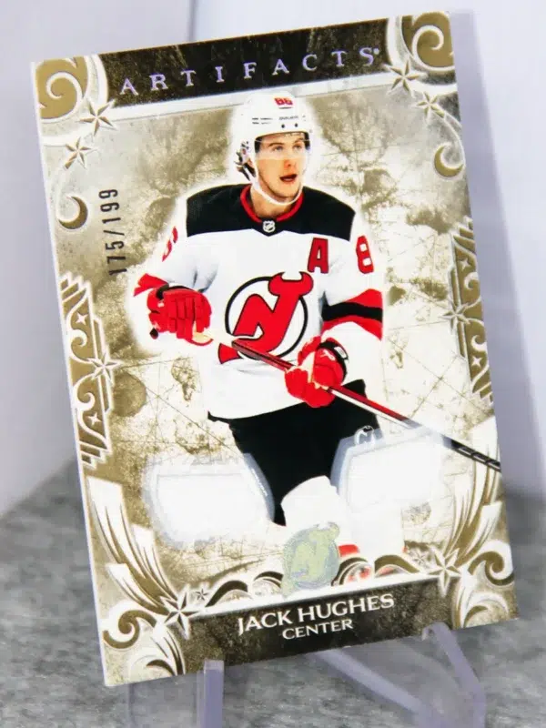 2024-25 Jack Hughes #149 Upper Deck Artifacts Hockey Dual Gold Materials SN#175 - stand