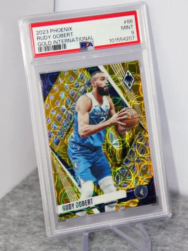 2023-24 Rudy Gobert #86 Panini Phoenix Gold International SN#07 PSA 9 MT - stand