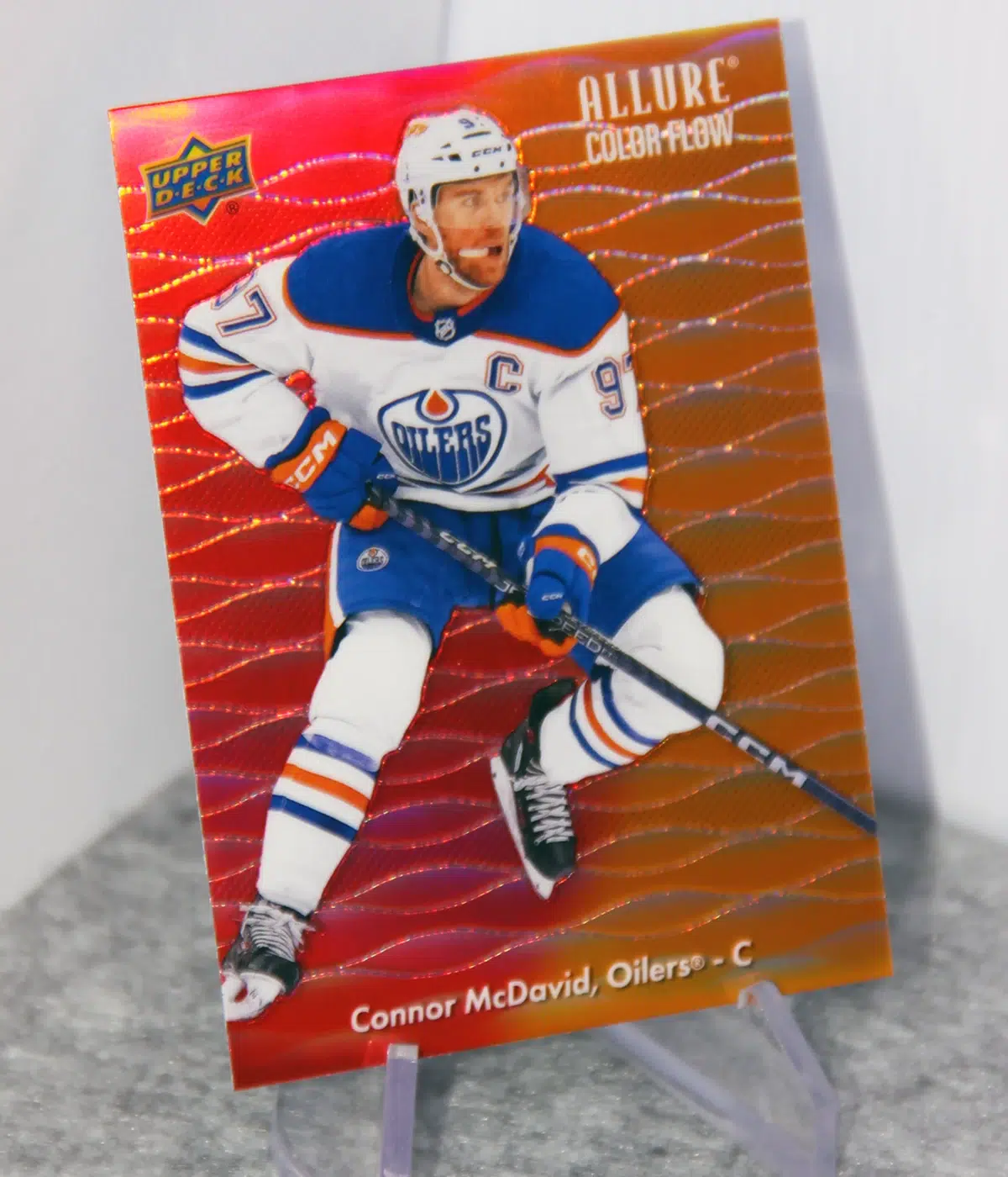 2023-24 Connor McDavid #CF-1 Upper Deck Allure Color Flow Red-Orange