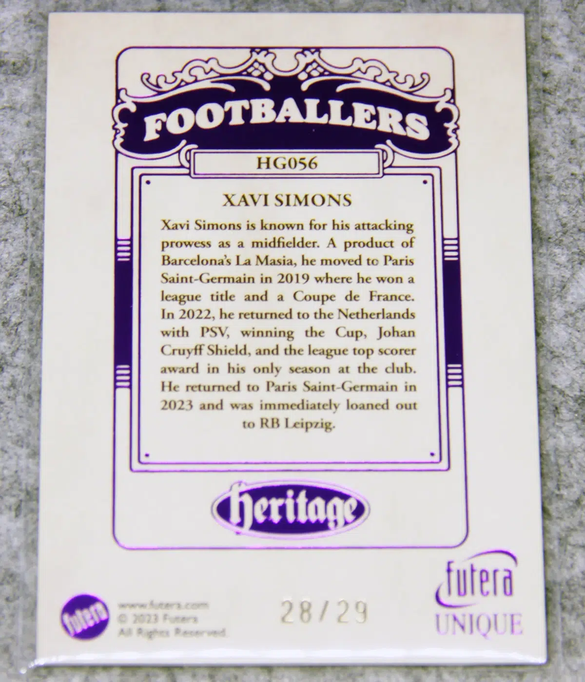 2023 Arjan Robben - Xavi Simons #HG056 Futera Unique Football Heritage Purple /29 Error Card