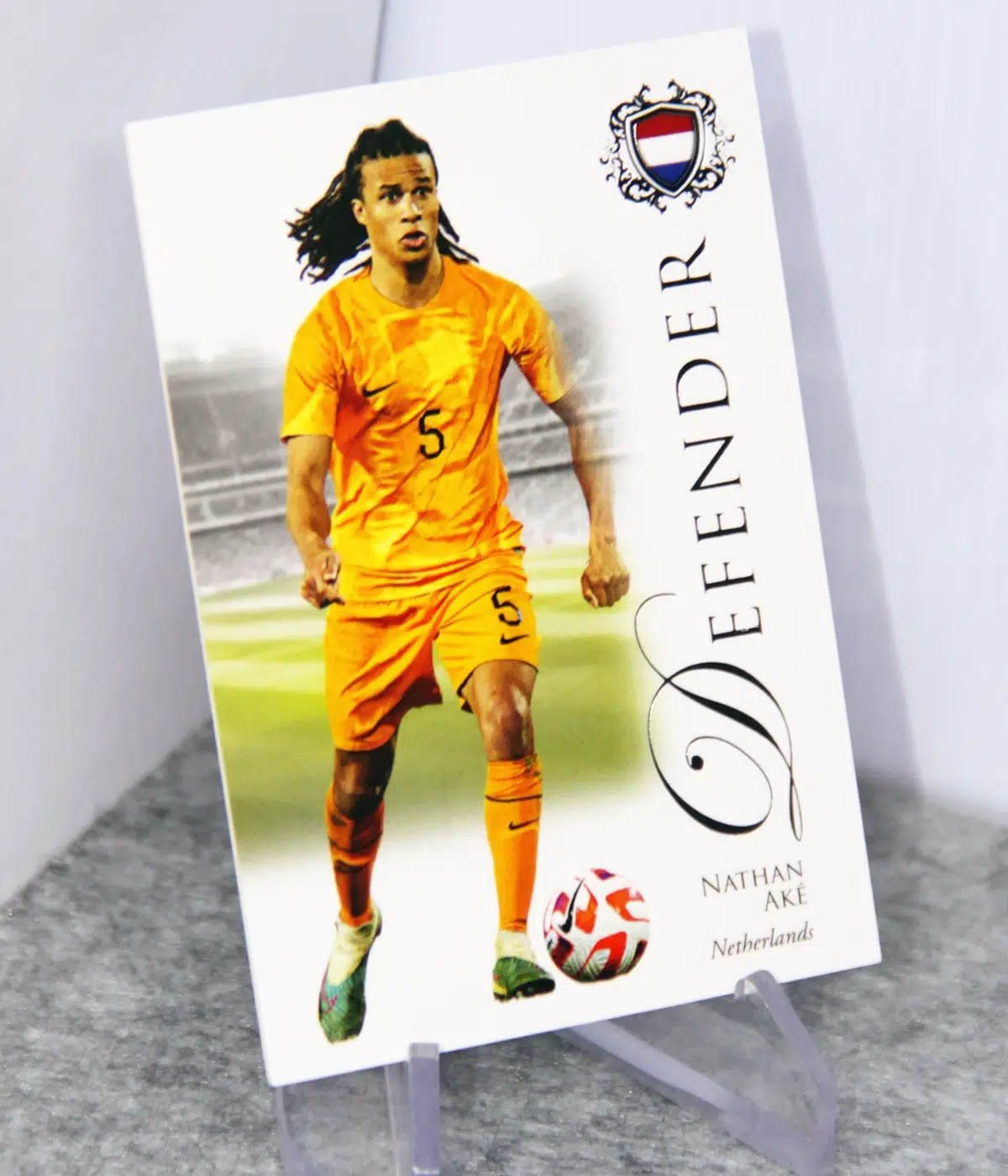 2023 Nathan Ake #006 Futera Unique Football Defender Silver /69