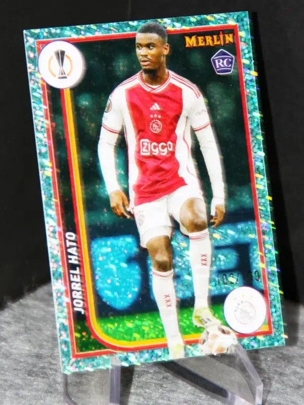 2024 Jorrel Hato #6 Topps Merlin UEFA Aqua Speckle RC /199