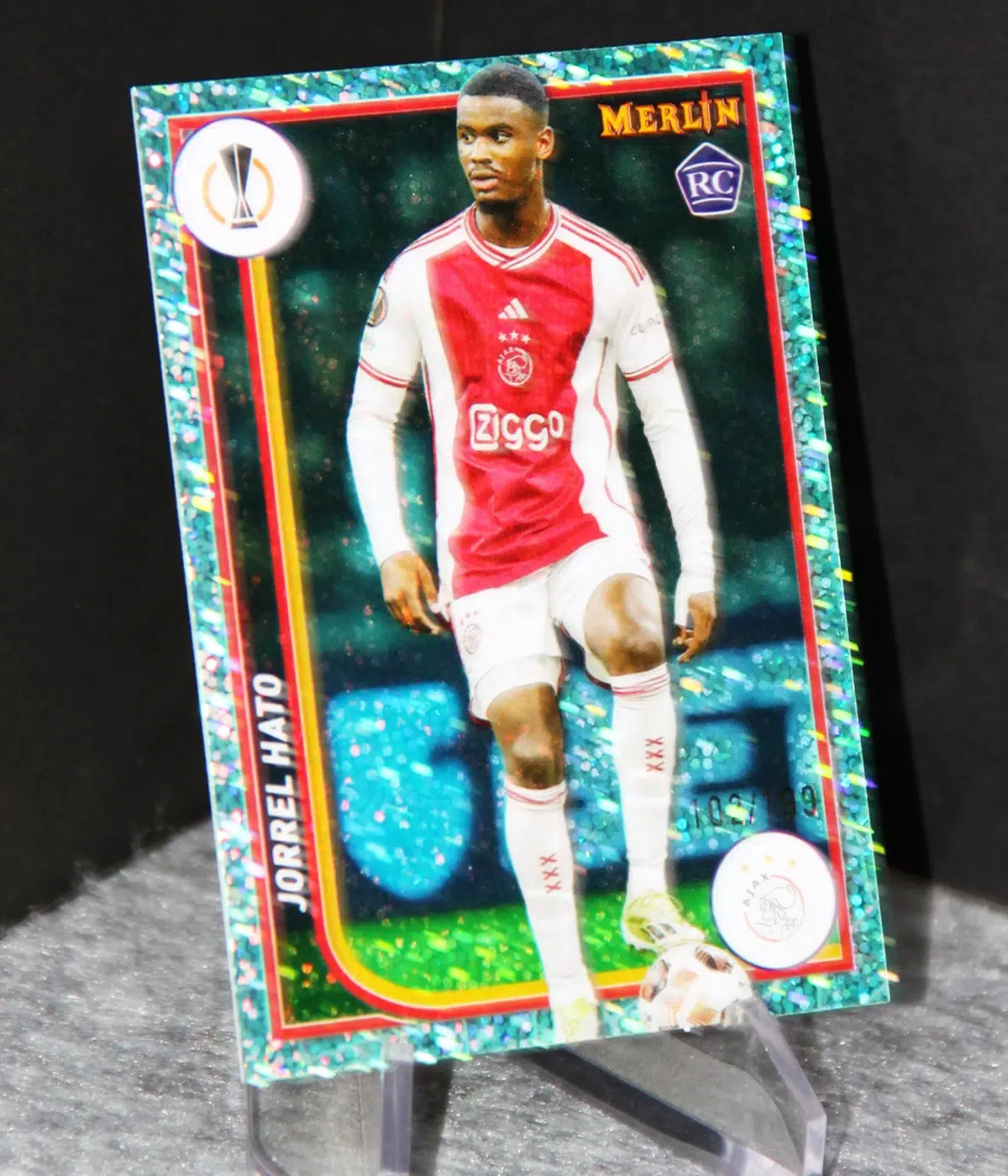 2024 Jorrel Hato #6 Topps Merlin UEFA Aqua Speckle RC /199