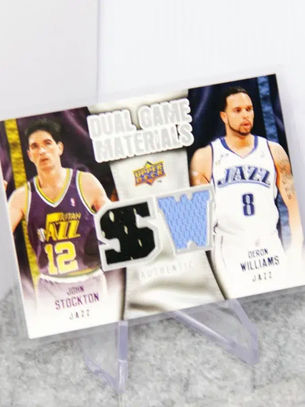 2009 10 John Stockton & Deron Williams #DG SW Upper Deck Dual Game Materials - stand