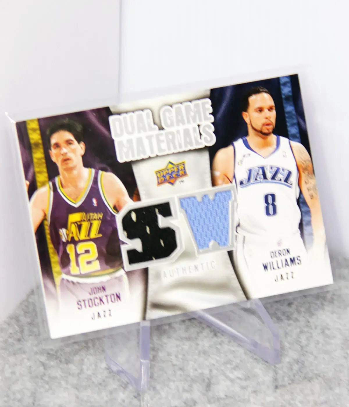 2009 10 John Stockton & Deron Williams #DG SW Upper Deck Dual Game Materials - stand