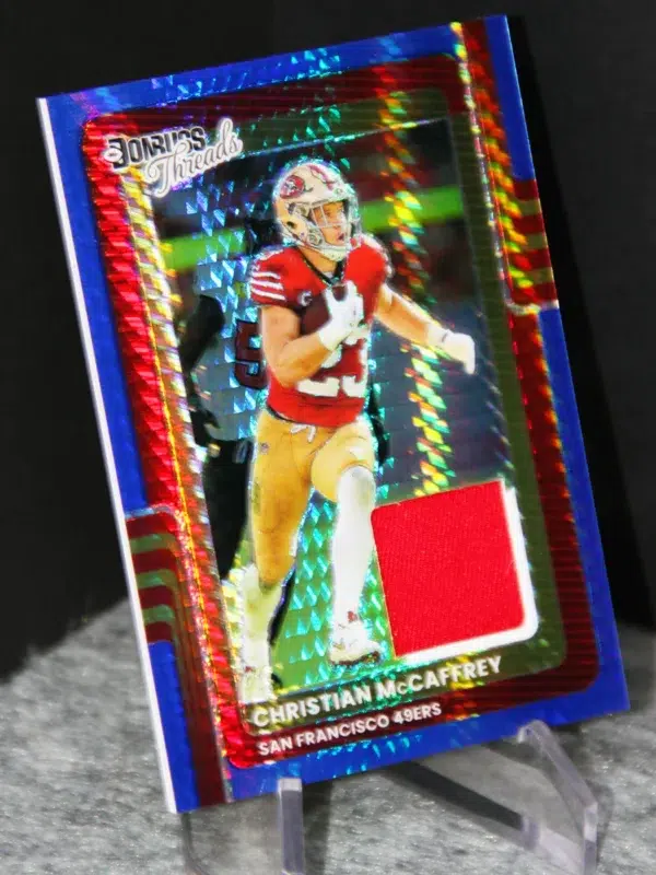 2025 Christian McCaffrey #DTBH CMY Panini Donruss Optic Donruss Threads Blue Hyper - stand
